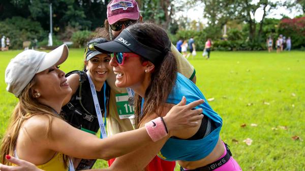 Sydney Half content post race female happy celebration left